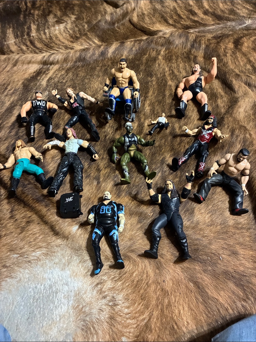 WWF plastic figures and wheelchair and suitcase